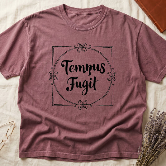 Dark Rose tee with cream "Tempus Fugit" script inside square filigree frame, decorative corner flourishes, classical typography.