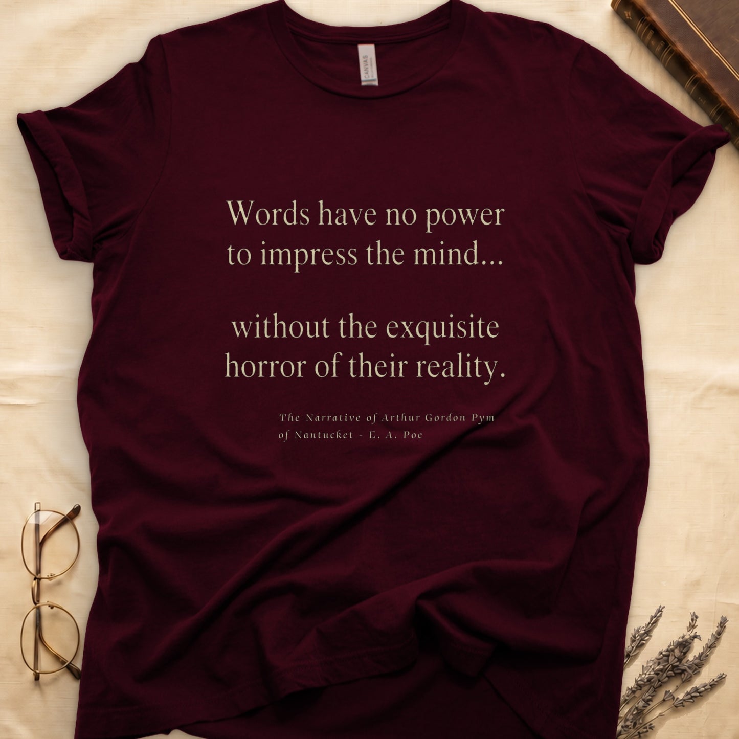 Maroon t-shirt with quote from Edgar Allan Poe's The Narrative of Arthur Gordon Pym.