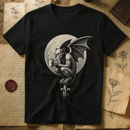 Black tee with gargoyle on stone pinnacle holding coffee mug, cream-parchment full moon behind, engraving style.