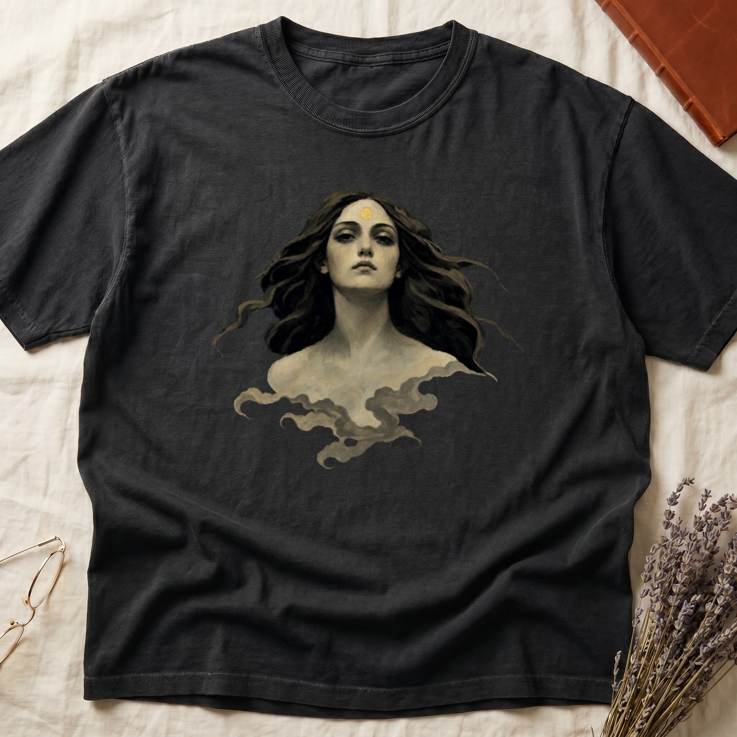 Dark gray t-shirt with a portrait of a woman with flowing hair and a sun symbol.