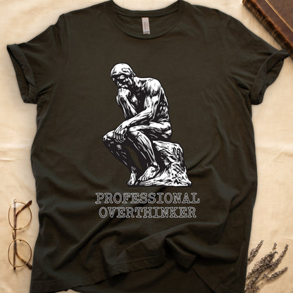 Military Green tee with monochrome rendering of Rodin's Thinker, "PROFESSIONAL OVERTHINKER" in serif capitals below.