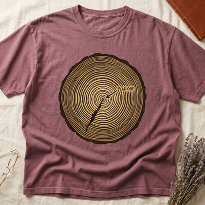 Dark Rose tee with cross-section of tree rings in warm brown, arrow pointing to center labeled "YEAR ONE" in serif type.
