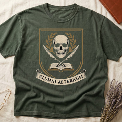 Green tee with heraldic shield, skull and gold laurels, crossed quills, open book, scroll "ALUMNI AETERNUM" below.