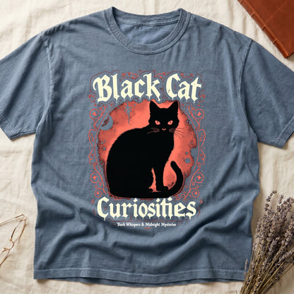 Blue Jean tee with black cat, red eyes, red-orange moon, "Black Cat Curiosities," "Dark Whispers & Midnight Mysteries."
