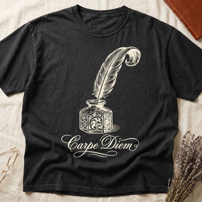 Black tee with ornate antique inkwell and quill pen in sepia linework, "Carpe Diem" in flowing cursive below.