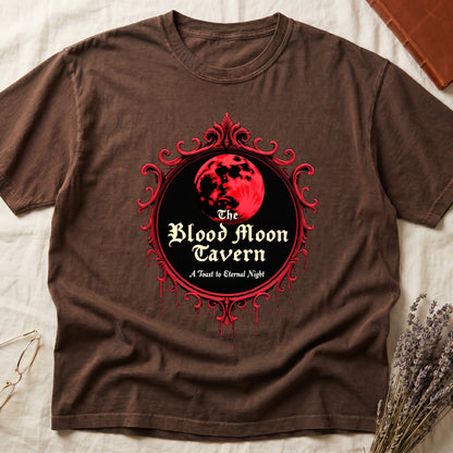 Espresso tee with red oval frame, blood-red moon, "The Blood Moon Tavern," "A Toast to Eternal Night," red drips below.