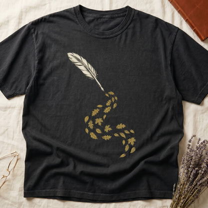 Black tee with antique quill pen in cream linework, oak and maple leaves cascading from the nib in gold and green.