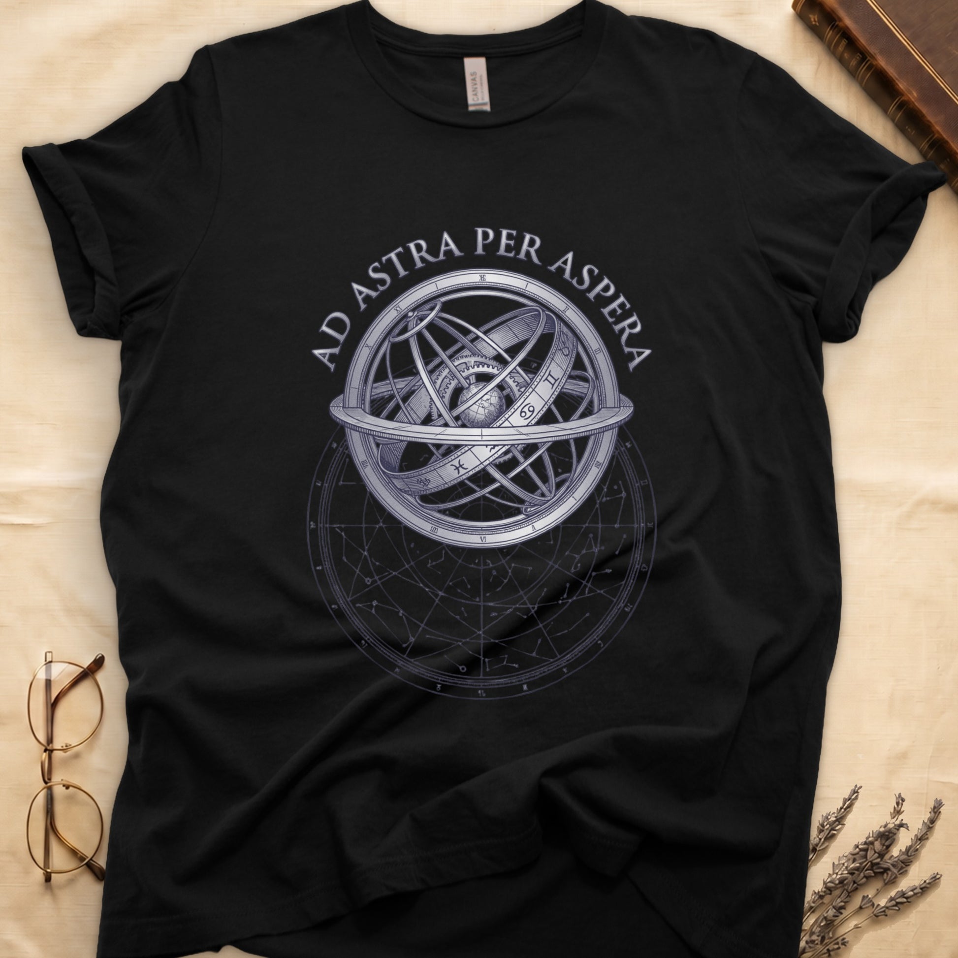 Black tee with engraved armillary sphere, "AD ASTRA PER ASPERA" in serif capitals, zodiac symbols, classical astronomy.