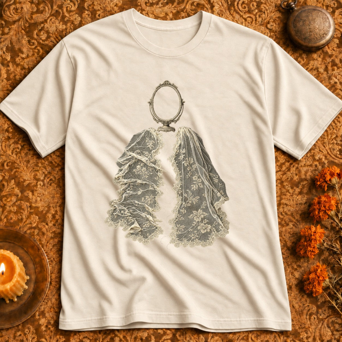 T-shirt with an oval mirror over lace-like lung anatomy illustration.