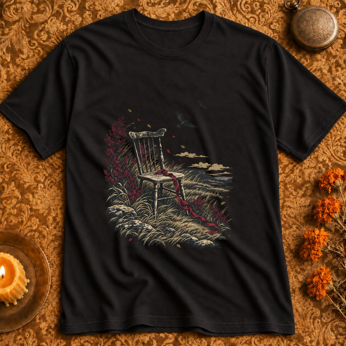 Black t-shirt with a graphic of an empty wooden chair in a field with a red ribbon.
