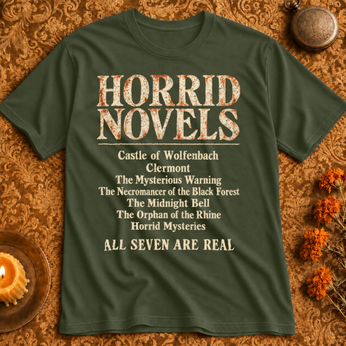 Green t-shirt with "Horrid Novels" and list of titles including "Castle of Wolfenbach" and "ALL SEVEN ARE REAL".