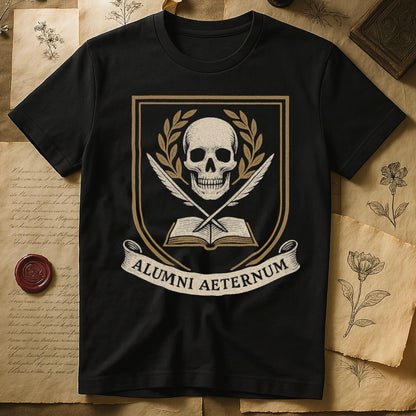Black tee with heraldic shield, skull and gold laurels, crossed quills, open book, scroll "ALUMNI AETERNUM" below.