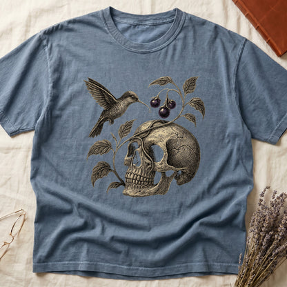 Blue Jean tee with sepia engraved skull, nightshade vine and dark-purple berries wrapping around, hummingbird at upper left.