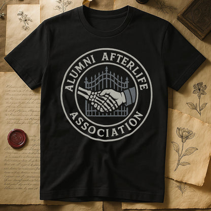 Black tee with embroidered patch, skeletal handshake at cemetery gate, "ALUMNI AFTERLIFE" top, "ASSOCIATION" bottom.