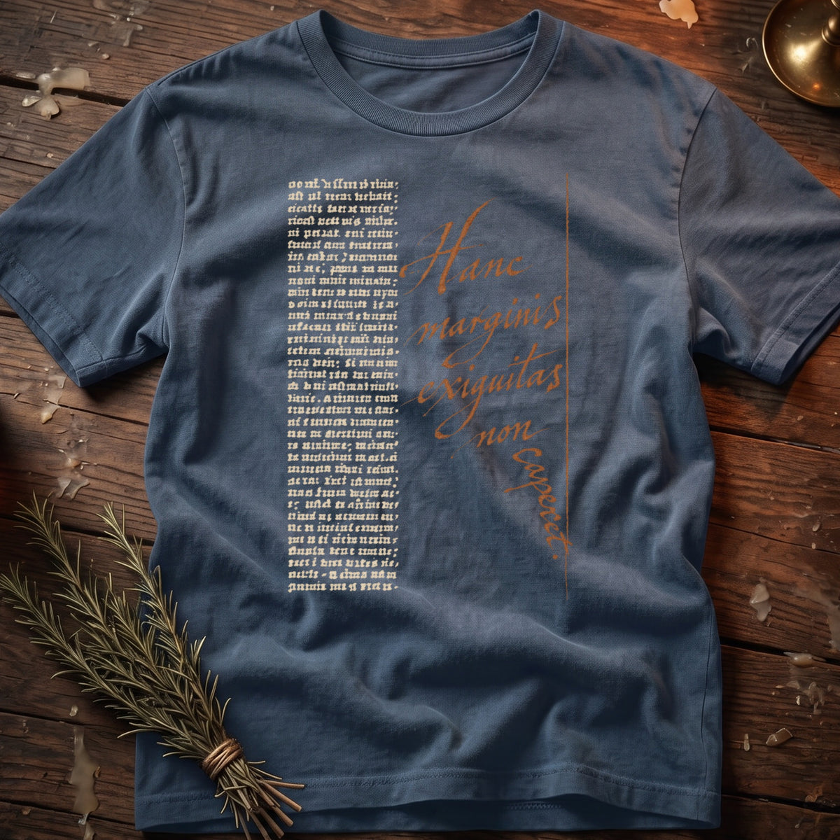 Blue t-shirt with black and orange text, featuring Latin script.