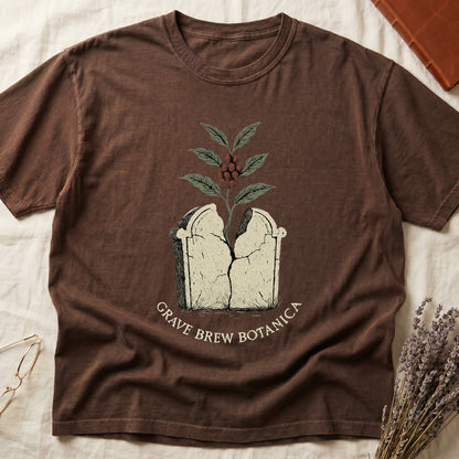 Brown t-shirt with cracked tombstone and coffee plant graphic, text reads "Grave Brew Botanica".
