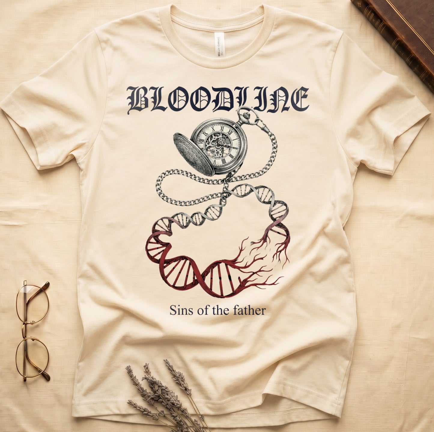 Natural tee with antique pocket watch chain becoming DNA helix with red roots, "BLOODLINE" top, "Sins of the father" below.
