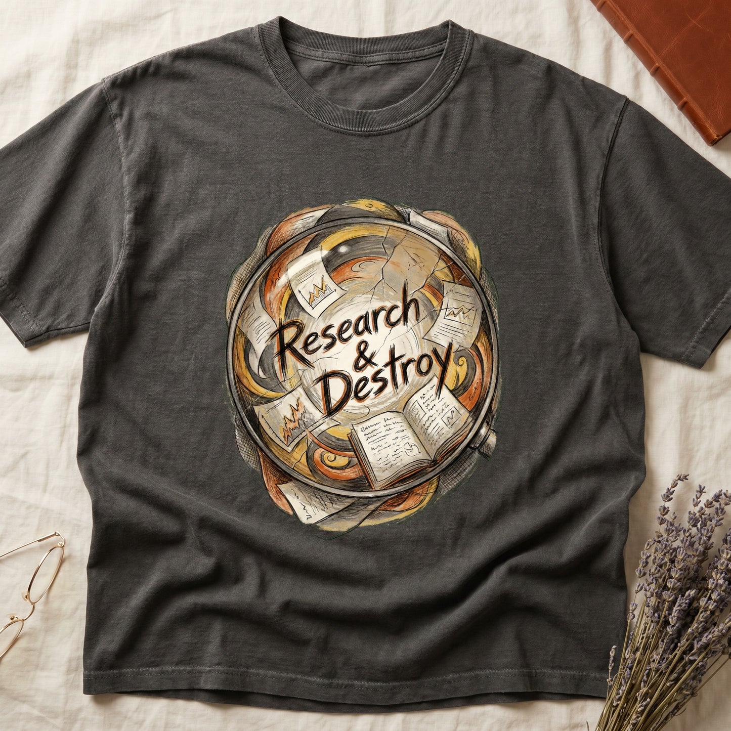 Pepper tee with globe of papers, open books, charts in colored ink, "Research & Destroy" in cursive at center.