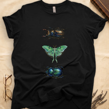 Black tee with three-panel Black-history plate: stag beetle, luna moth, scarab beetle in ink on yellow ground.