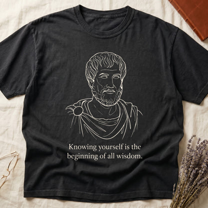 Black tee with classical philosopher bust in cream linework, "Knowing yourself is the beginning of all wisdom" below.