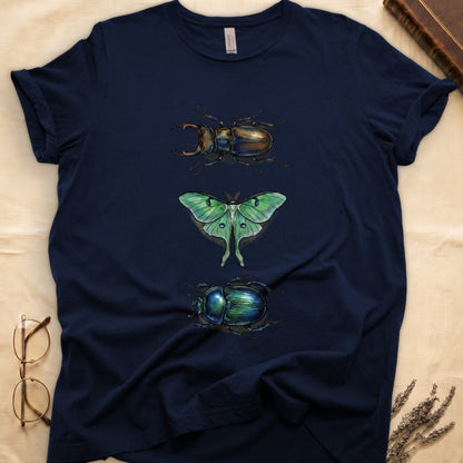 Black tee with three-panel Navy-history plate: stag beetle, luna moth, scarab beetle in ink on yellow ground.