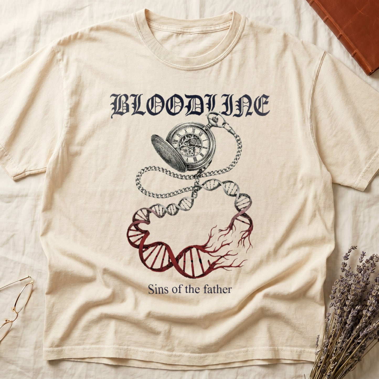 Ivory tee with antique pocket watch chain becoming DNA helix with red roots, "BLOODLINE" top, "Sins of the father" below.