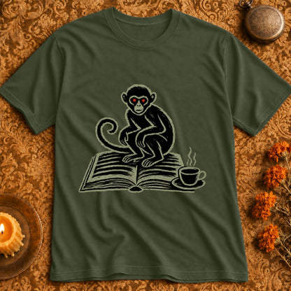 T-shirt with dark green color, featuring a black monkey with red eyes sitting on an open book.