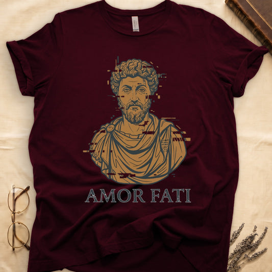 Maroon tee with bearded Stoic bust portrait in copper and slate, "AMOR FATI" in distressed serif capitals below.