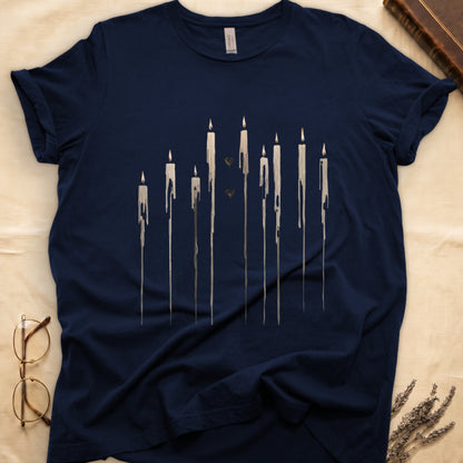 Dark navy t-shirt with a minimalist dripping candle design and two small hearts.