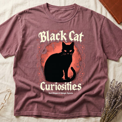 Dark Rose tee with black cat, red eyes, red-orange moon, "Black Cat Curiosities," "Dark Whispers & Midnight Mysteries."