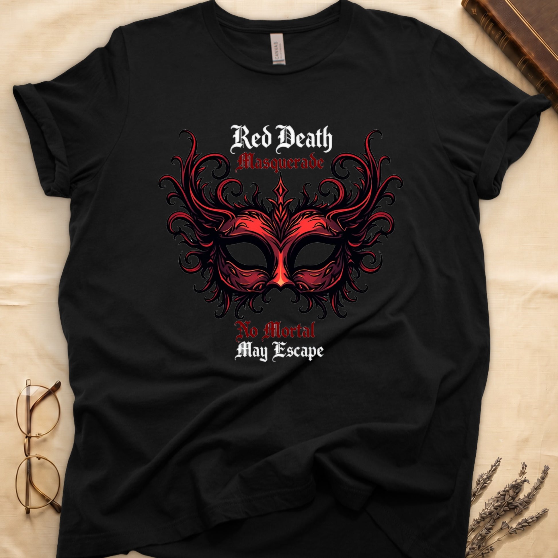 Black tee with ornate red masquerade mask, flame scrollwork, "Red Death Masquerade" top, "No Mortal May Escape" below.