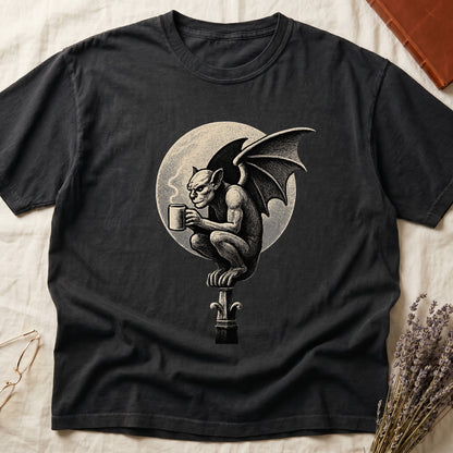 Black tee with gargoyle on stone pinnacle holding coffee mug, cream-parchment full moon behind, engraving style.