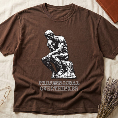 Espresso tee with monochrome rendering of Rodin's Thinker, "PROFESSIONAL OVERTHINKER" in serif capitals below.