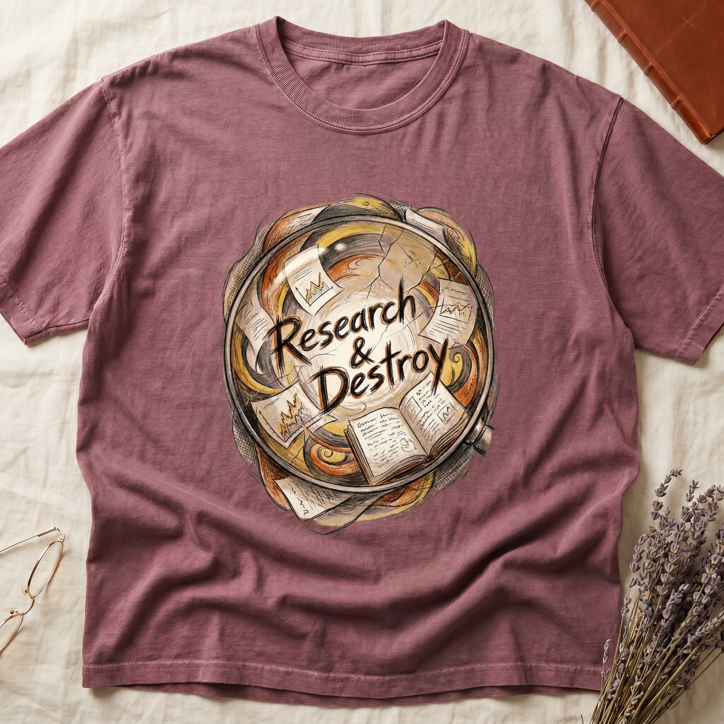 Dark Rose tee with globe of papers, open books, charts in colored ink, "Research & Destroy" in cursive at center.