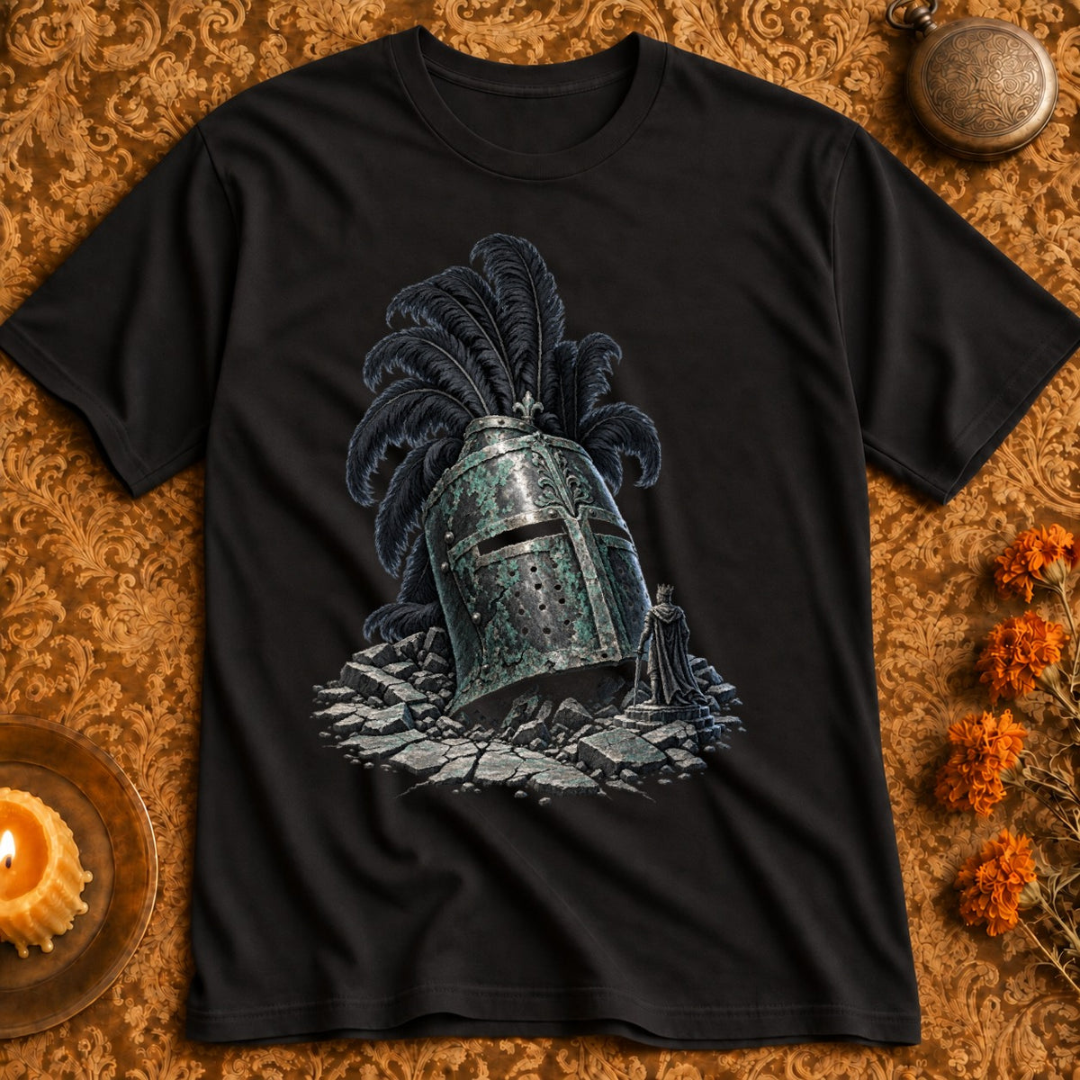 Black t-shirt featuring a weathered knight's helmet with black feathers, broken stones, and a small figure.