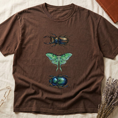 Black tee with three-panel Espresso-history plate: stag beetle, luna moth, scarab beetle in ink on yellow ground.