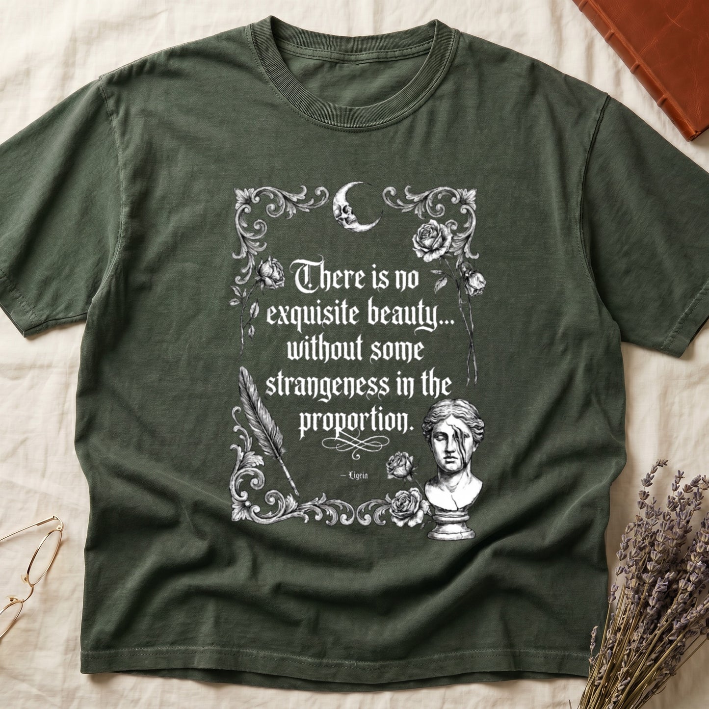 Green t-shirt with vintage quote design and bust of a statue.