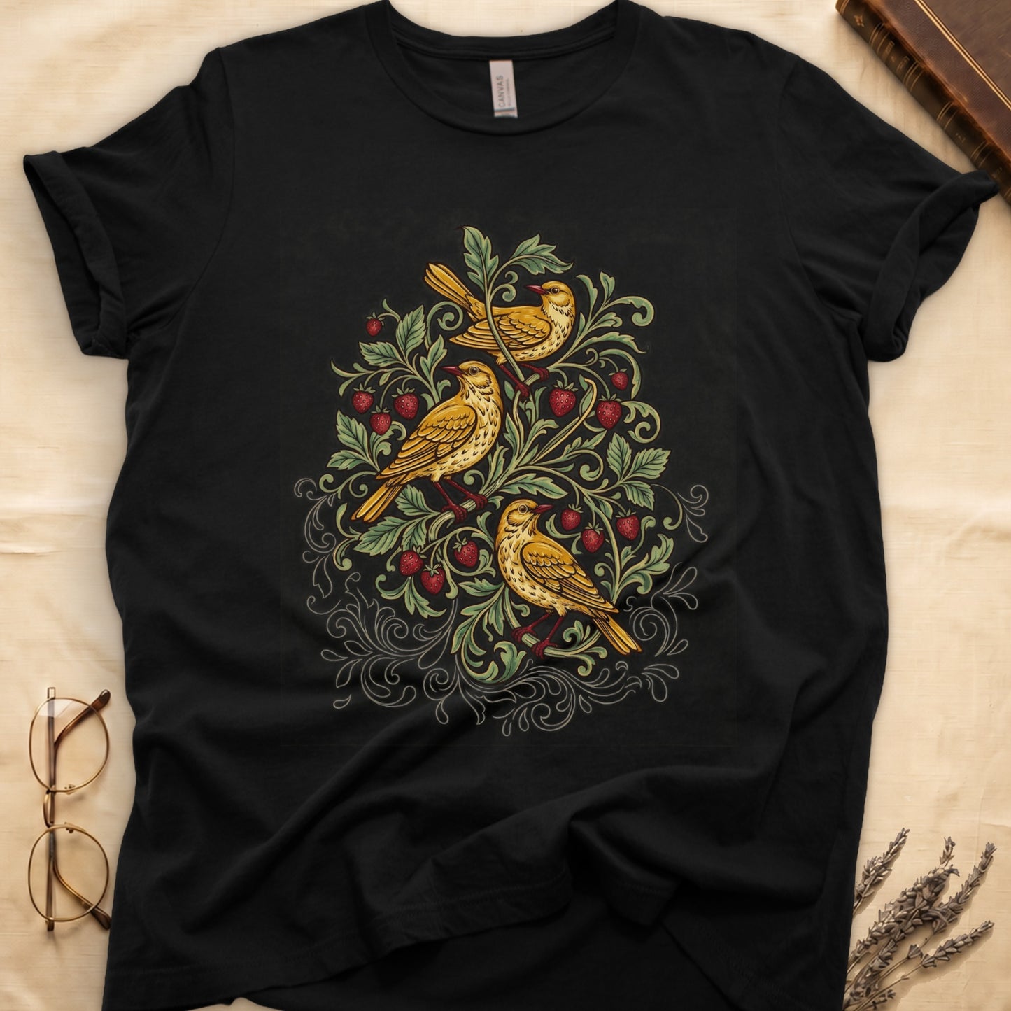 Black tee with three yellow songbirds perched among strawberry vines and green leaves, William Morris pattern style.