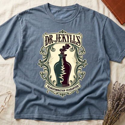 Blue Jean tee with apothecary label, green elixir bottle, lightning bolt, smoke, "DR. JEKYLL'S," "TRANSFORMATION GUARANTEED."