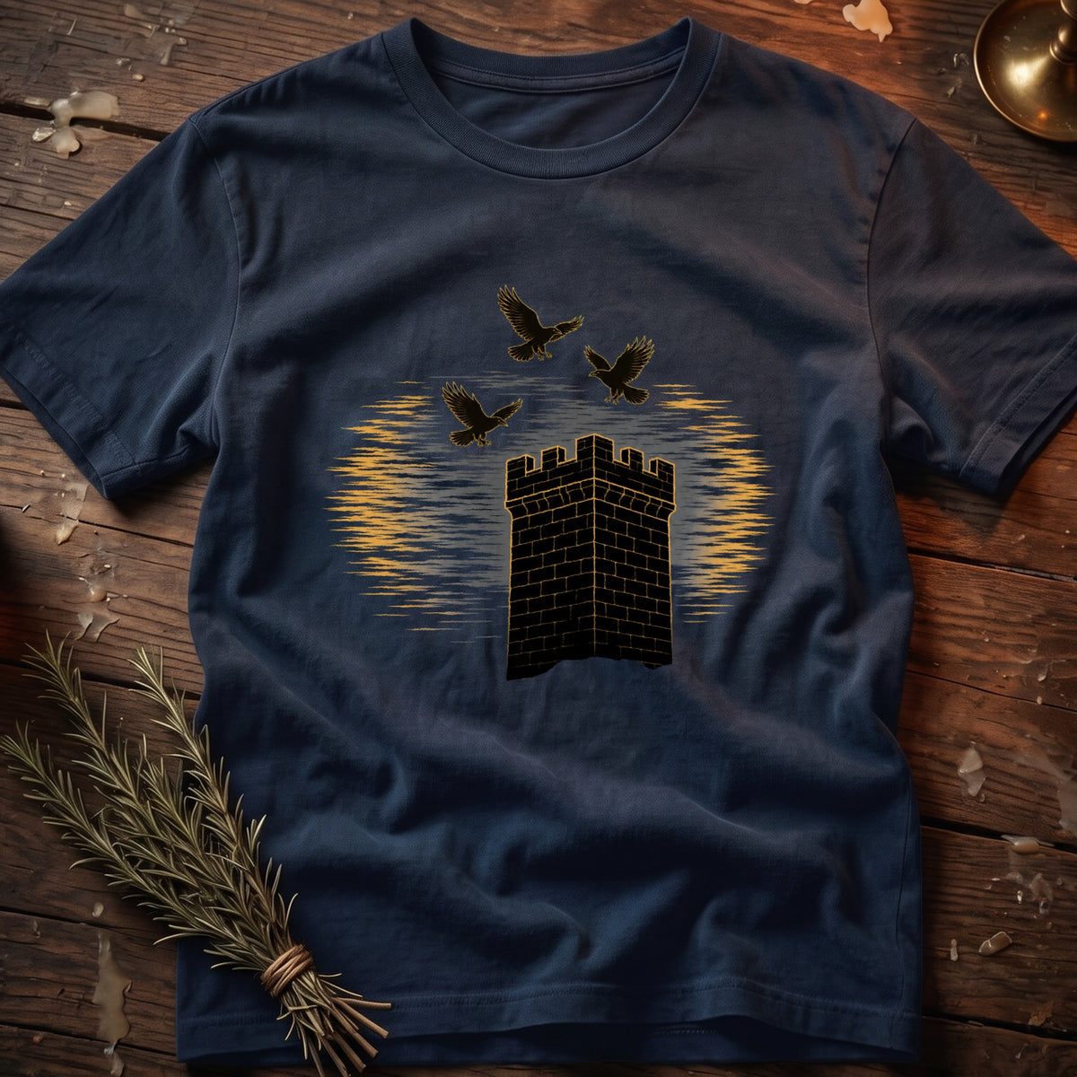 Dark blue t-shirt with a graphic of a brick tower and three ravens.