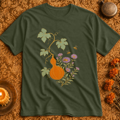 Green t-shirt with a pumpkin, purple flowers, and bees design.
