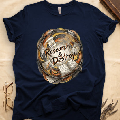 Navy tee with globe of papers, open books, charts in colored ink, "Research & Destroy" in cursive at center.