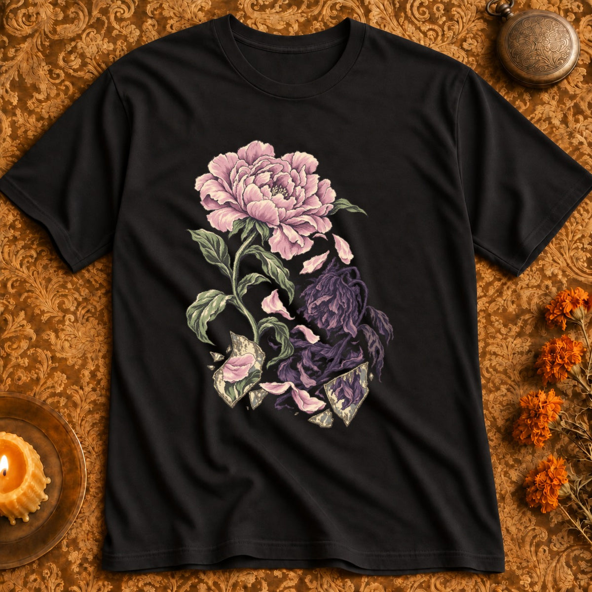 Black t-shirt with a pink peony, wilting purple flowers, and shattered glass design.