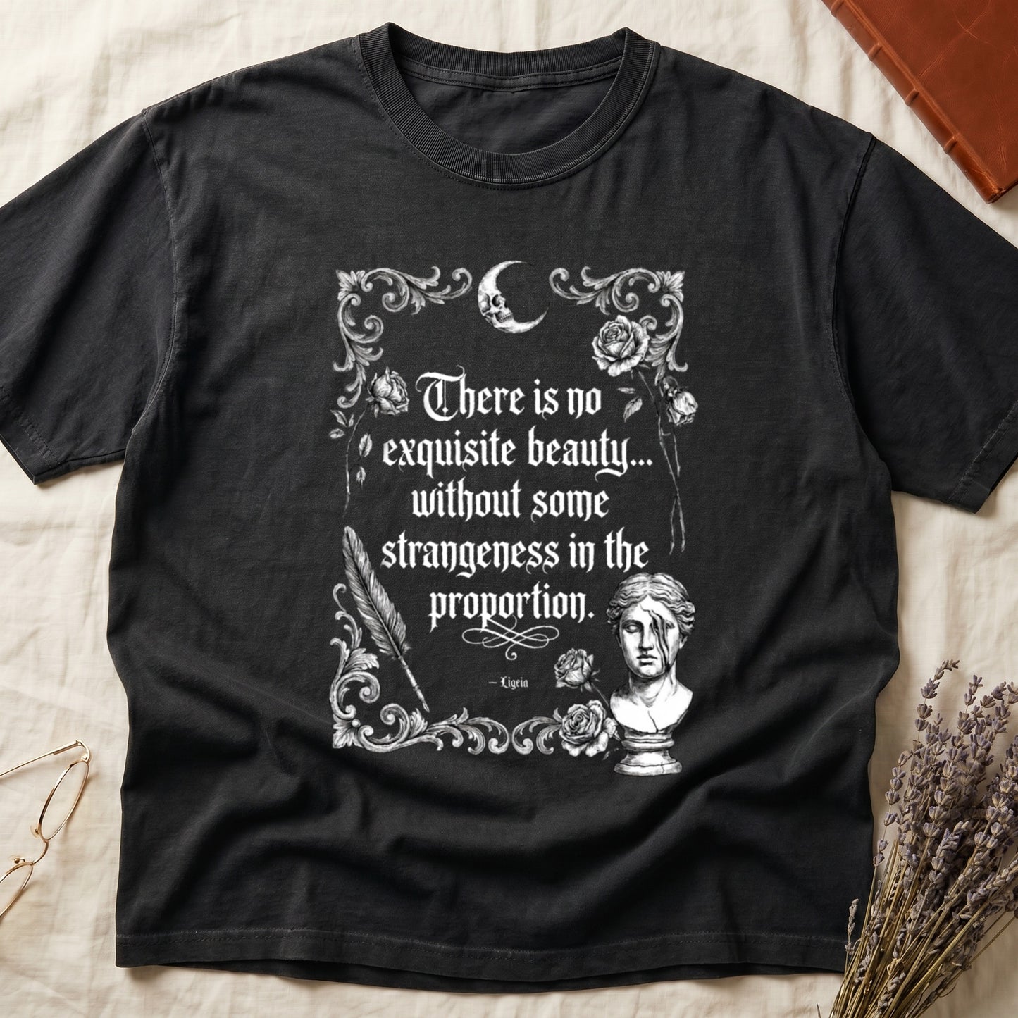 Black t-shirt with gothic-style text and illustrations of a skull moon and bust.