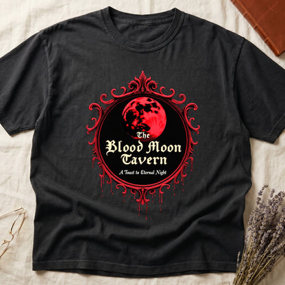 Black tee with red oval frame, blood-red moon, "The Blood Moon Tavern," "A Toast to Eternal Night," red drips below.
