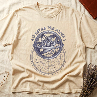Ivory tee with engraved armillary sphere, "AD ASTRA PER ASPERA" in serif capitals, zodiac symbols, classical astronomy.