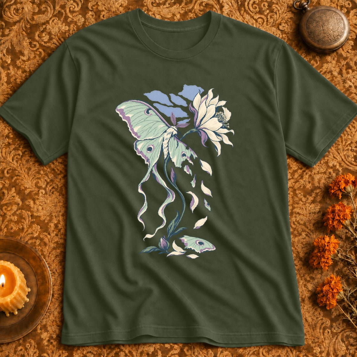 Green t-shirt with luna moth and white flower illustration.