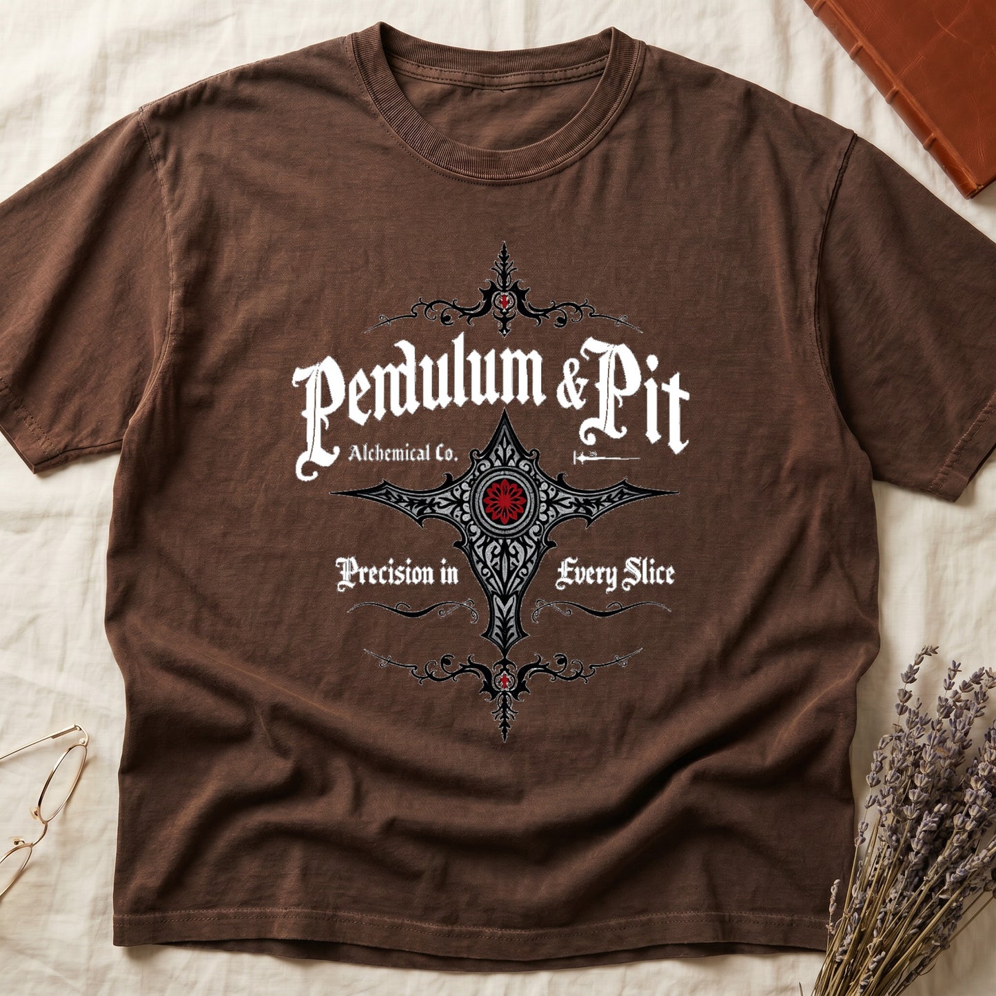 Espresso tee with white talismanic cross, "Pendulum & Pit Alchemical Co.," "Precision in Every Slice" banner ribbons.