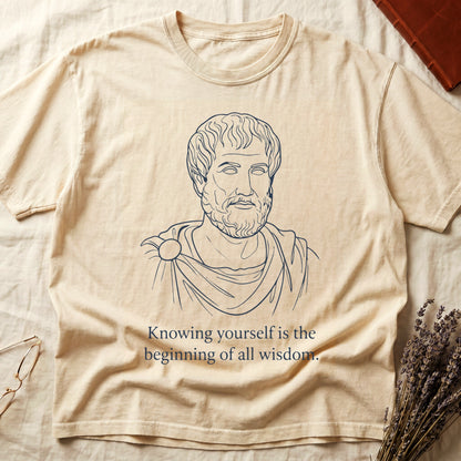 Ivory tee with classical philosopher bust in cream linework, "Knowing yourself is the beginning of all wisdom" below.