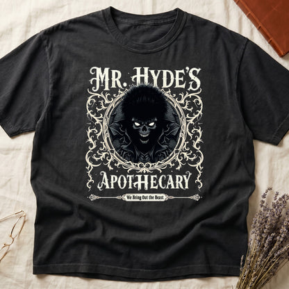 Pepper tee with ornate filigree frame, wild-haired skull figure, "MR. HYDE'S APOTECARY," "We Bring Out the Beast" below.